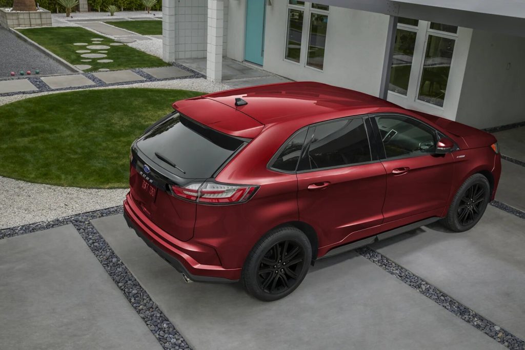 Red 2022 Ford Edge parked on a driveway.