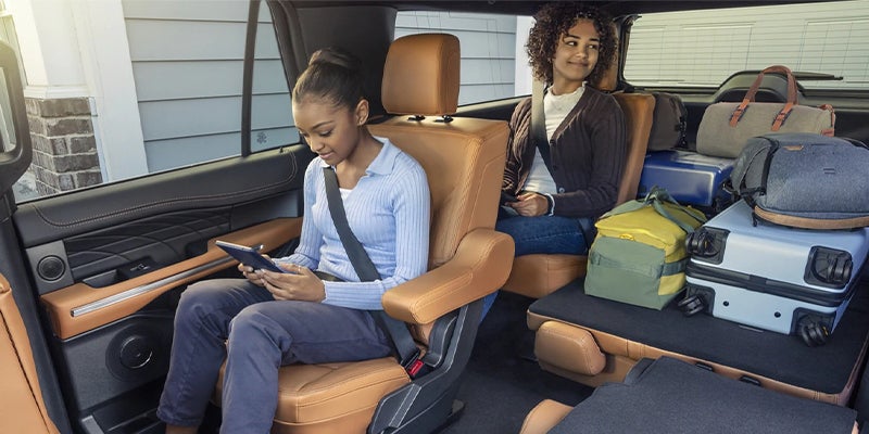 A family inside the 2023 Ford Expedition.