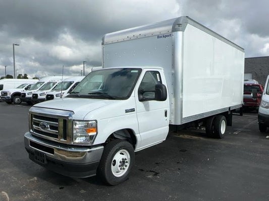 A white 2024 Ford E-450SD.