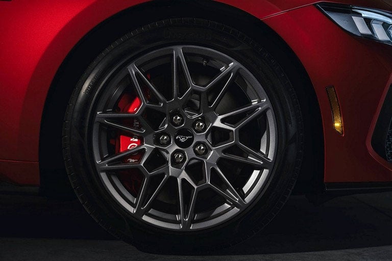 2024 Ford Mustang® model with a close-up of a wheel and brake caliper | Coughlin Ford of Heath in Newark OH